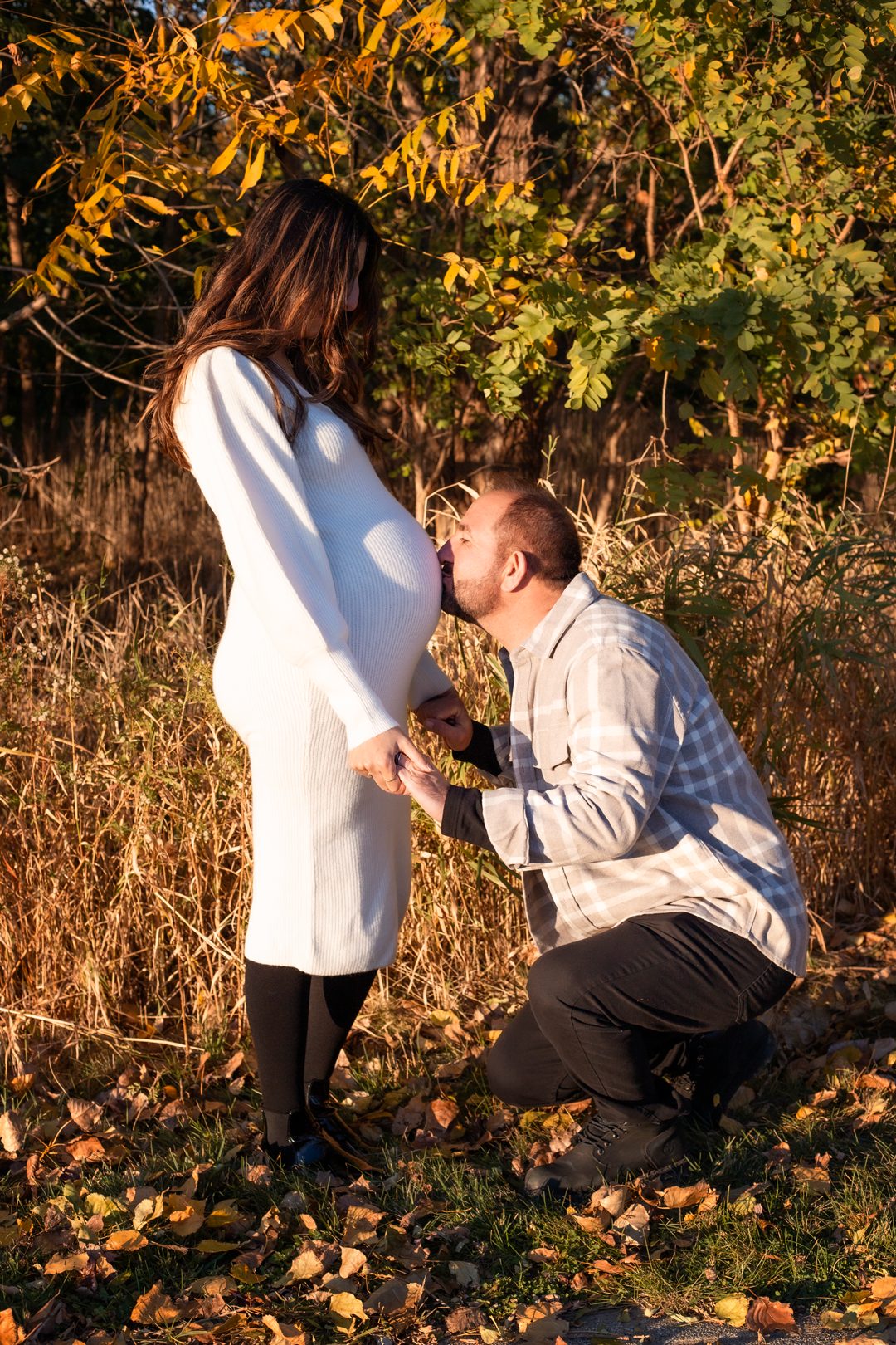 Maternity couple sweet moment