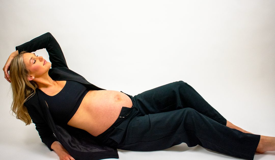 Maternity studio portrait reclining